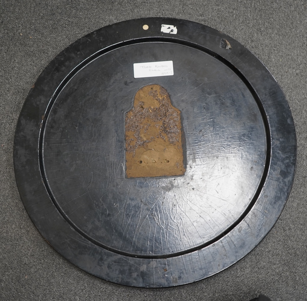 A Victorian japanned table top, depicting Indian grave robbers